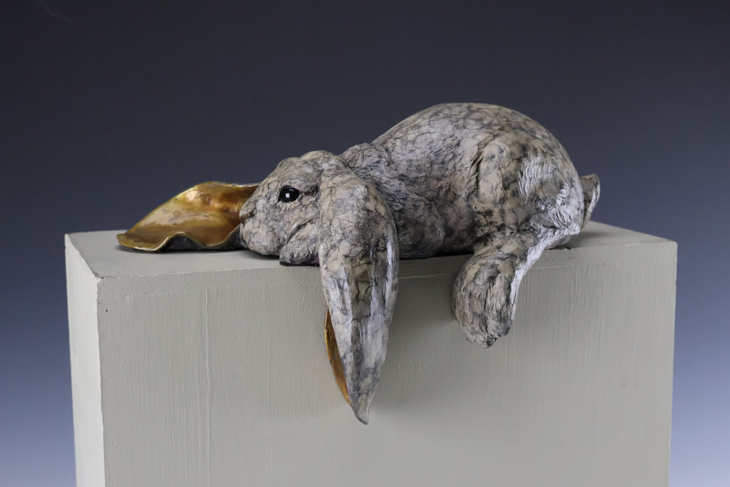 Lazy Lop bronze rabbit sculpture by Mark Dziewior at 7 Mile Creek Studio.