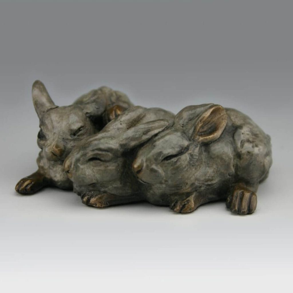 Cuddle Buns bronze rabbit sculpture by Mark Dziewior at 7 Mile Creek Studio.