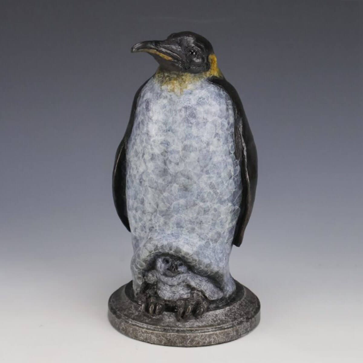 First Peek bronze penguing sculpture by Mark Dziewior at 7 Mile Creek Studio.