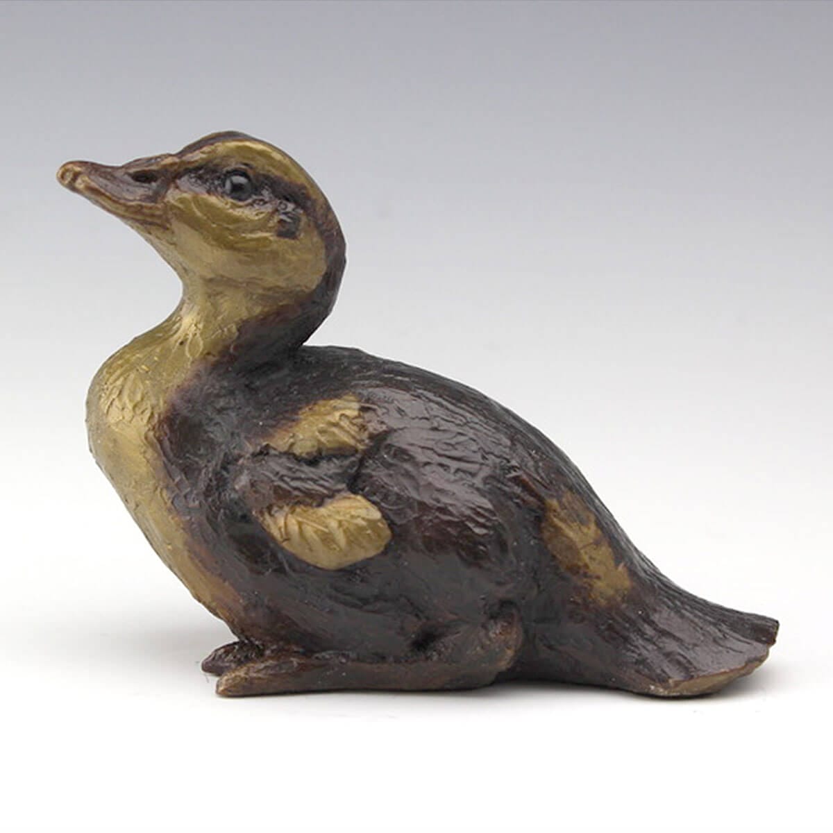 Lil' Dabbler bronze duckling sculpture by Mark Dziewior at 7 Mile Creek Studio.