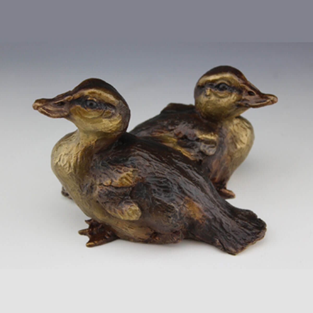 Mallard Ducklings bronze sculpture by Mark Dziewior at 7 Mile Creek Studio.