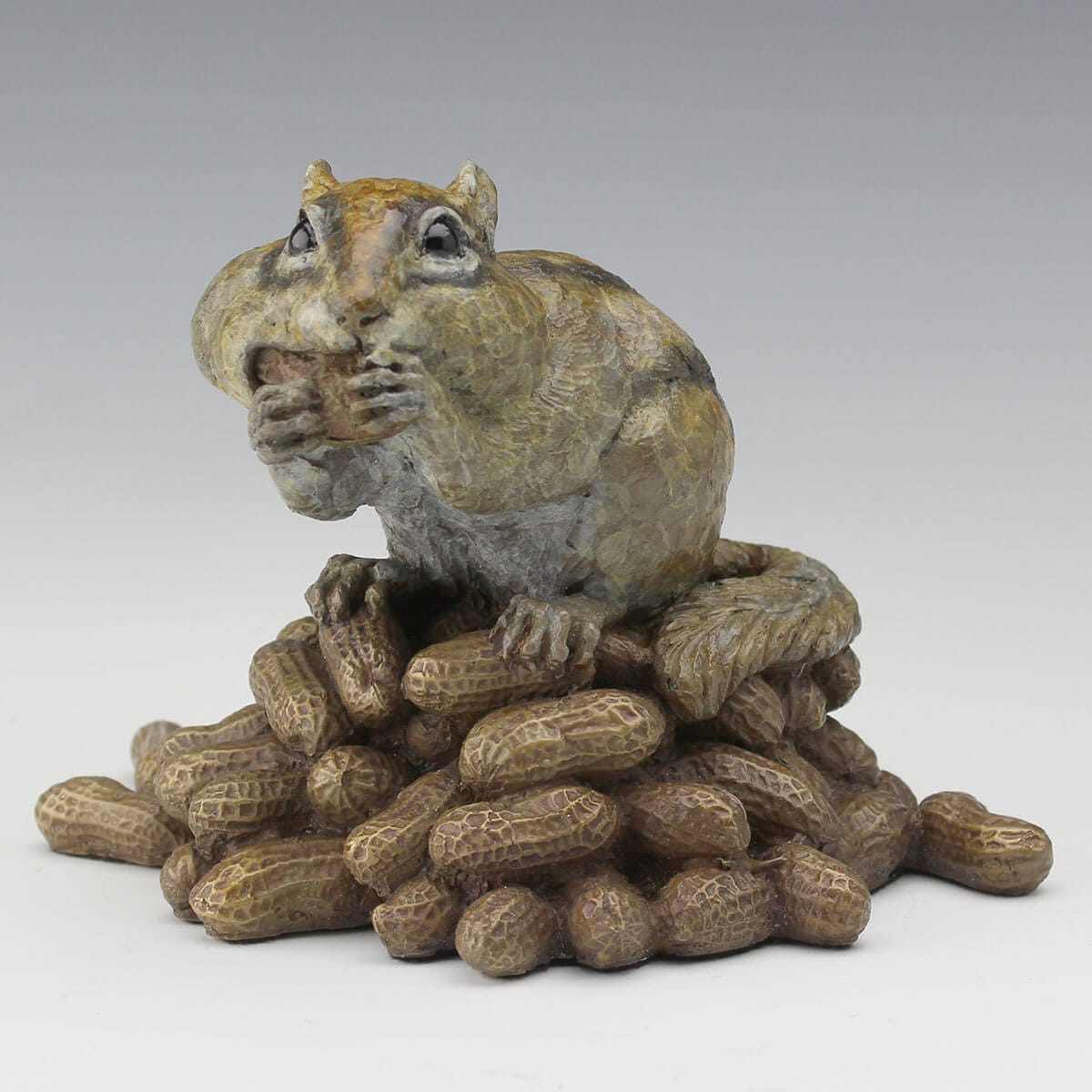 One for the Road bronze squirrel sculpture by Mark Dziewior at 7 Mile Creek Studio.
