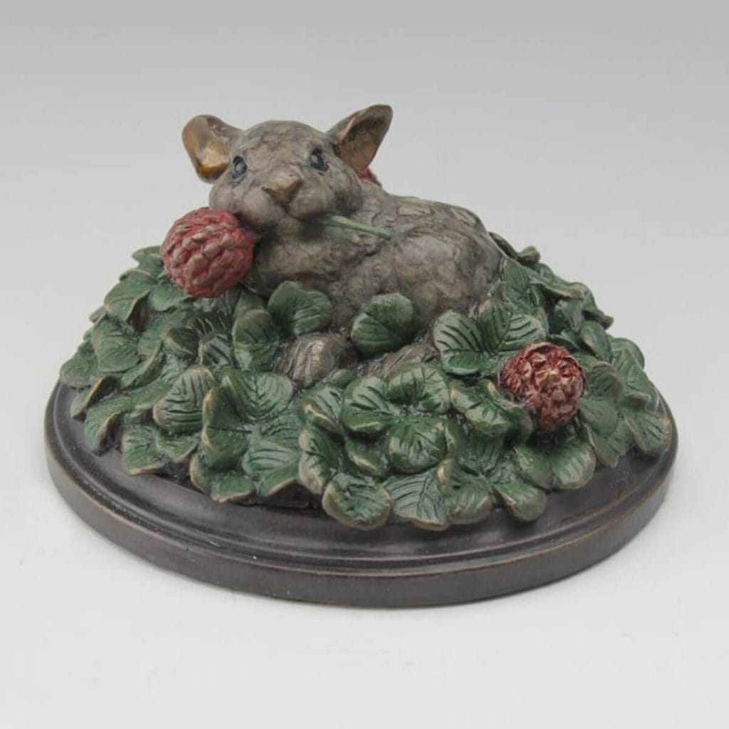 Rolling in Clover bronze rabbit sculpture by Mark Dziewior at 7 Mile Creek Studio.