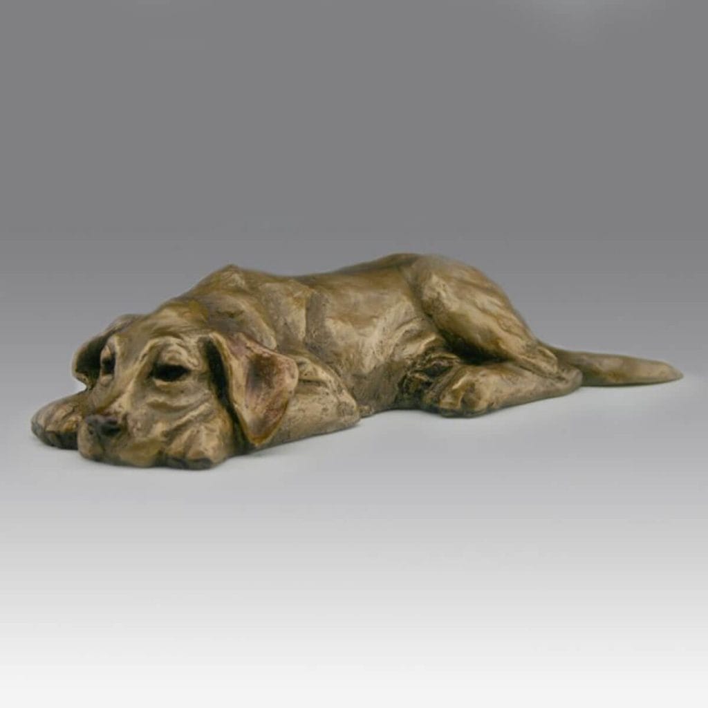 Tuckered Out bronze puppy sculpture by Mark Dziewior at 7 Mile Creek Studio.
