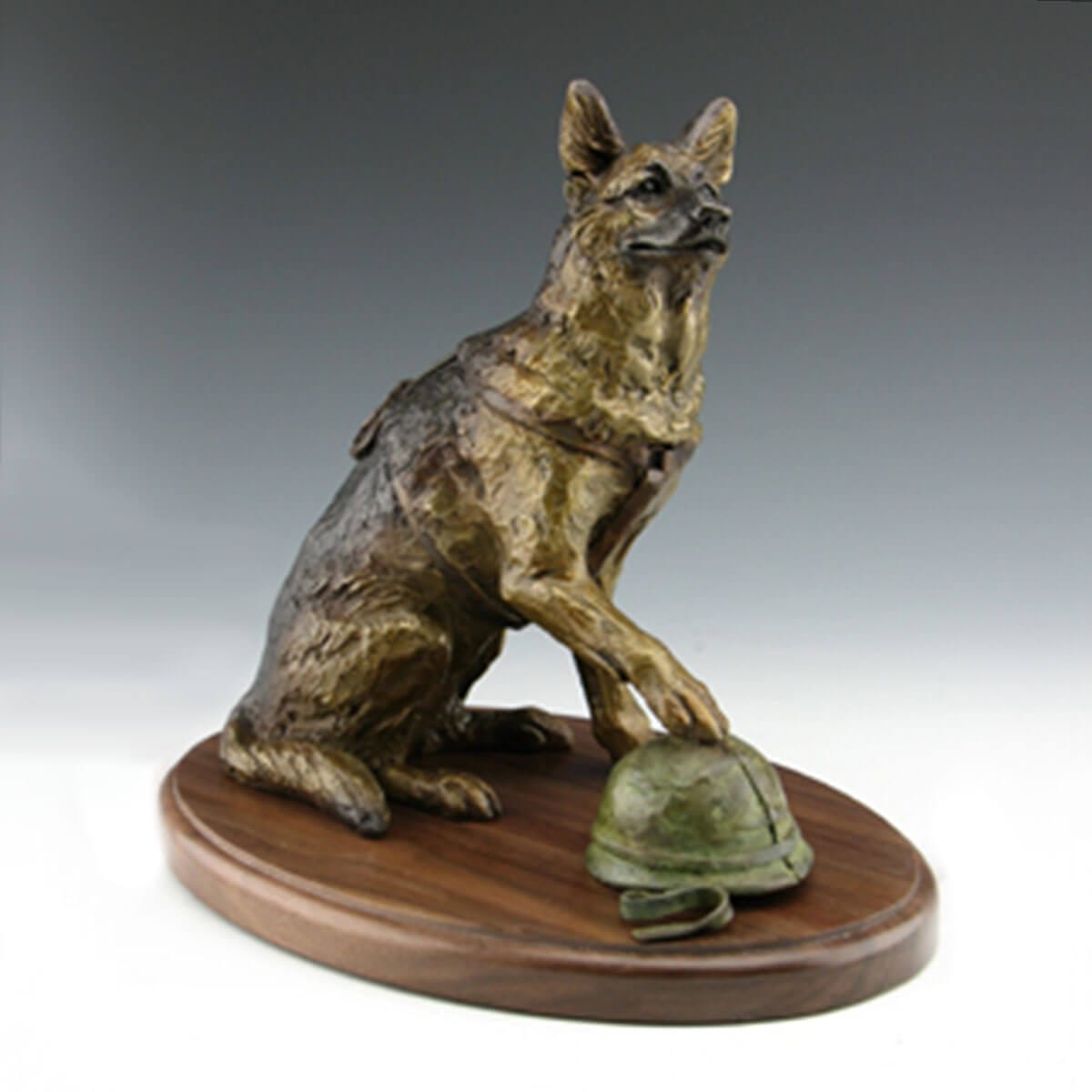 Unbreak able Bone bronze military dog tabletop sculpture by Mark Dziewior at 7 Mile Creek Studio