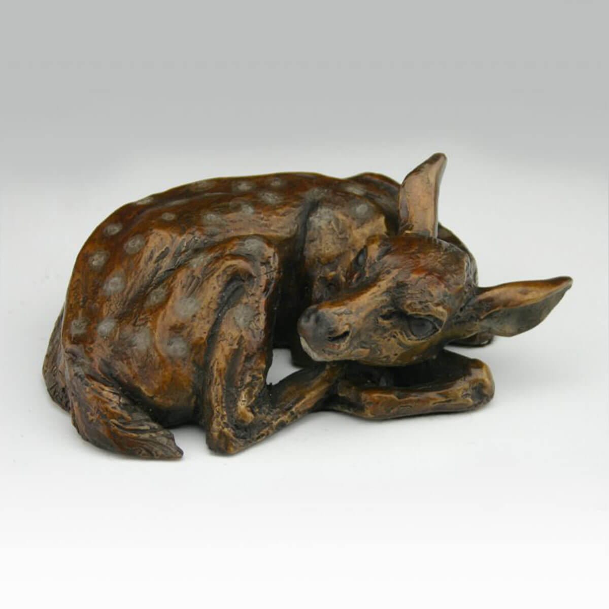 White Tail Fawn bronze sculpture by Mark Dziewior at 7 Mile Creek Studio